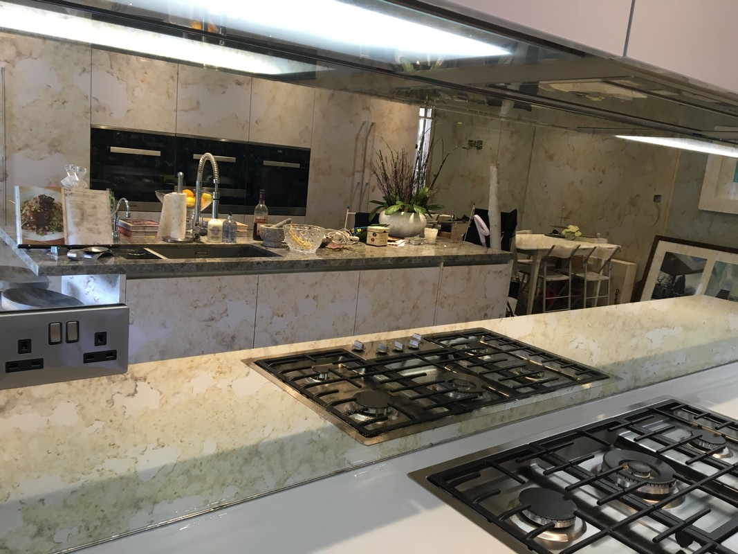 Mirror glass splashback in Nine Elms luxury kitchen
